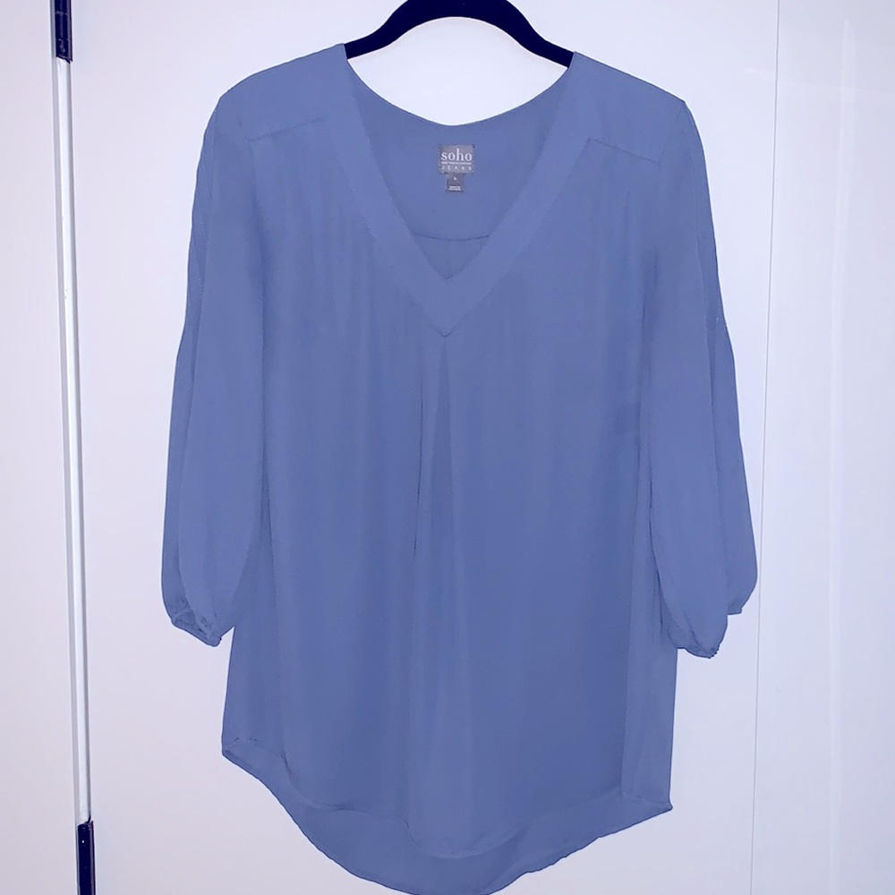 Light blue top